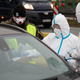Medical staff on the Polish side of the Jedrzychowice border crossing between Poland and Germany on March 9, 2020.
